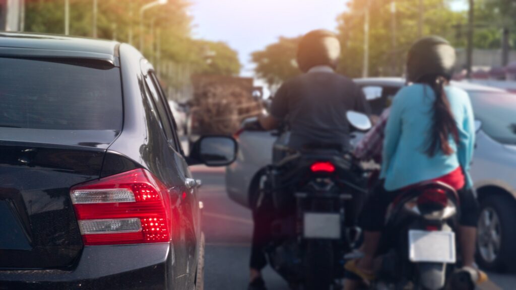 Motorcycles filtering between cars in congested traffic questioning is lane splitting legal in Florida.