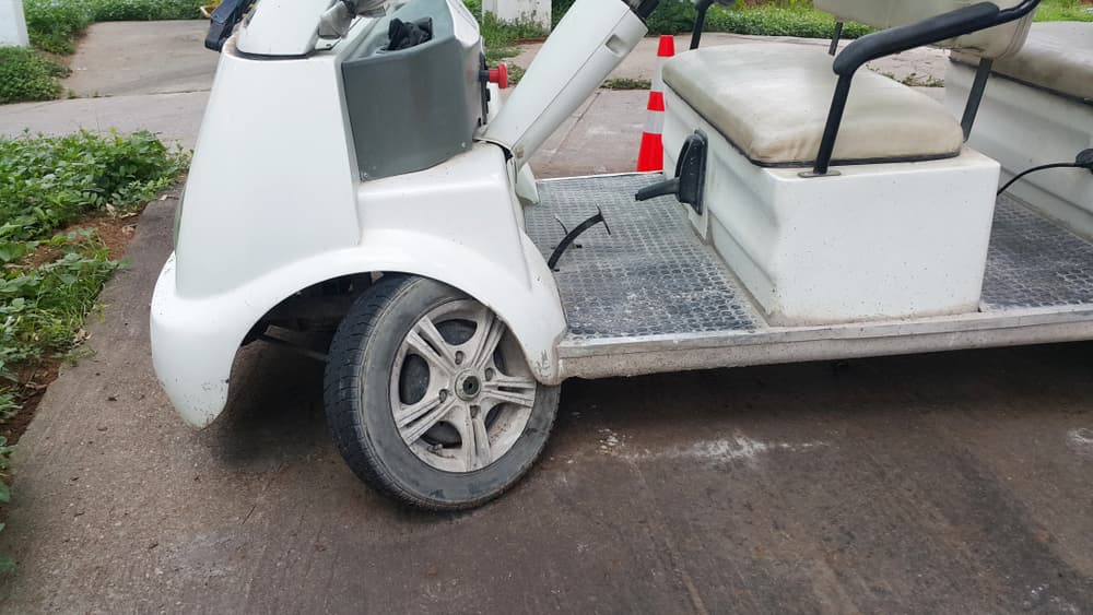 electrical golf cart , wheel damaged parking wait for repair