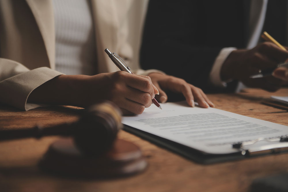 Lawyer meeting with a client to discuss a retirement home abuse or neglect claim