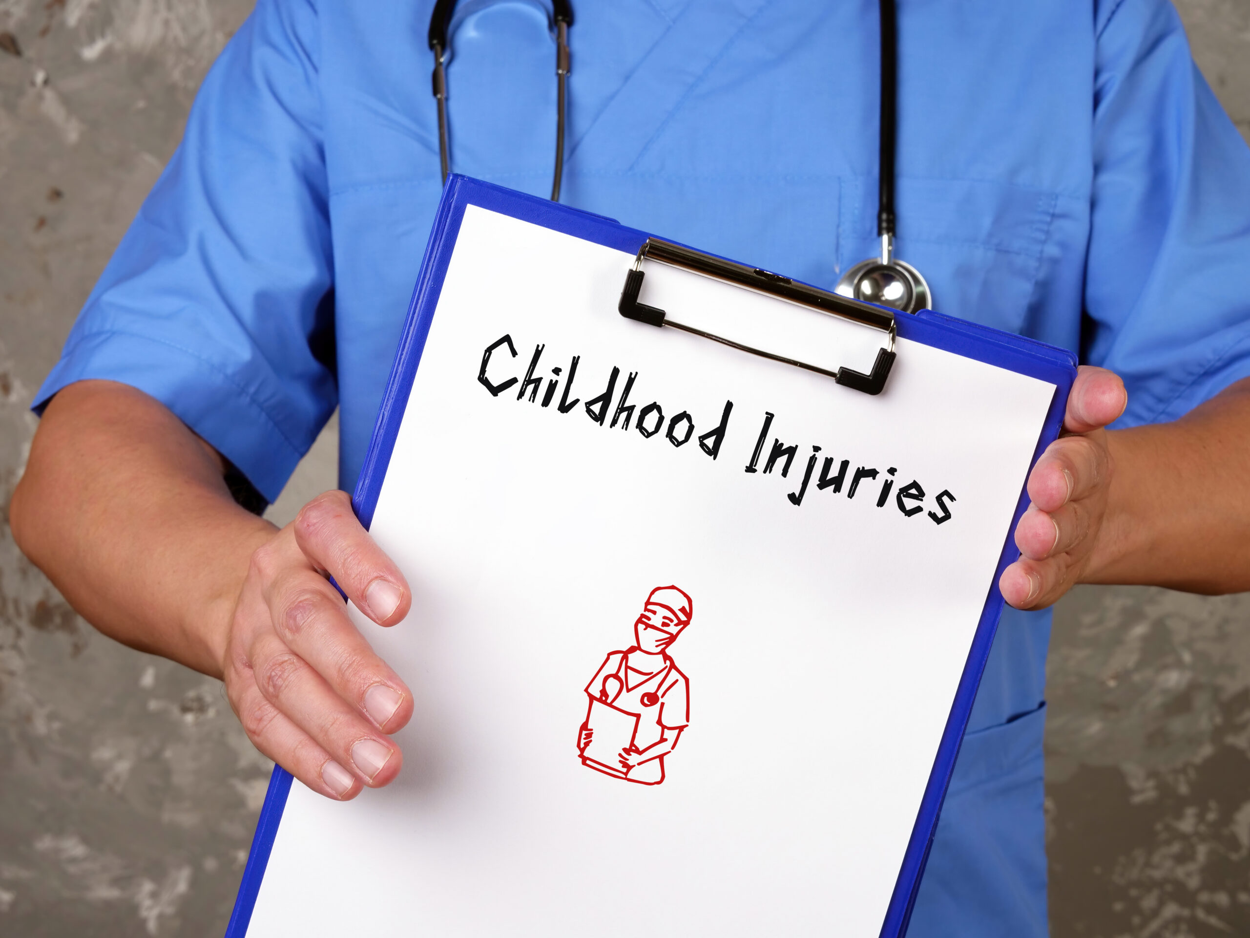 Medical professional holding clipboard labeled childhood injuries representing child injury lawsuit process in Florida