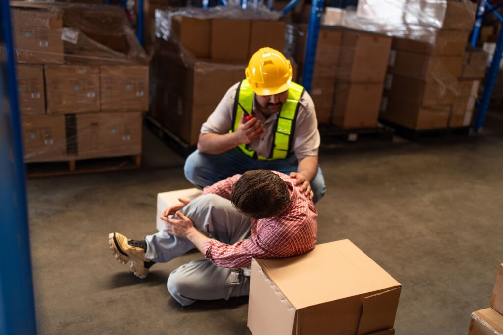 Injured construction worker in Clearwater receiving assistance after workplace accident Florida rising injury rates