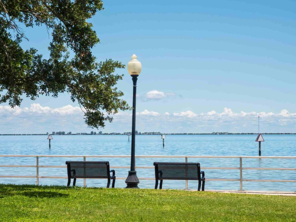 Waterfront park benches in Safety Harbor served by drunk driving accident lawyers.