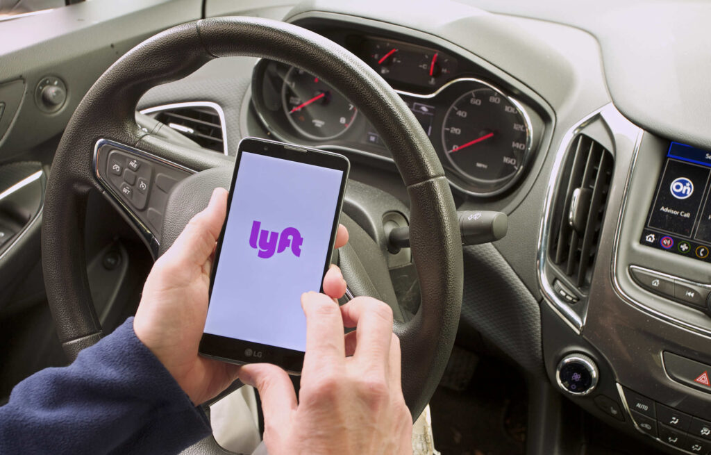 Driver using the Lyft app, representing claims handled by Safety Harbor Lyft accident lawyers.