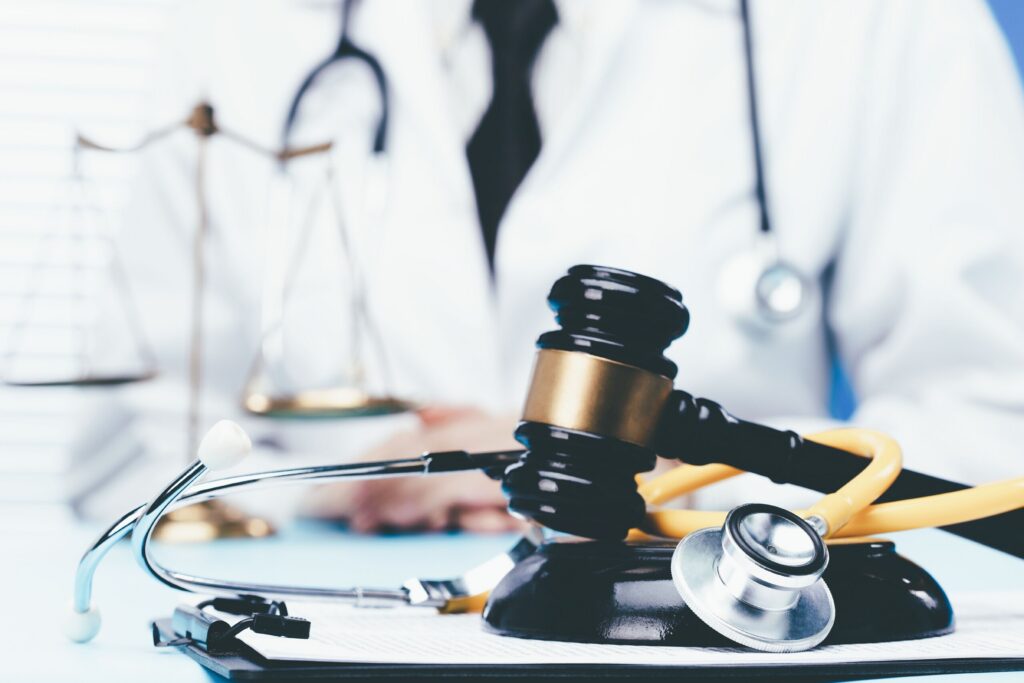 Gavel and stethoscope representing legal help for Safety Harbor injury victims seeking medical compensation.