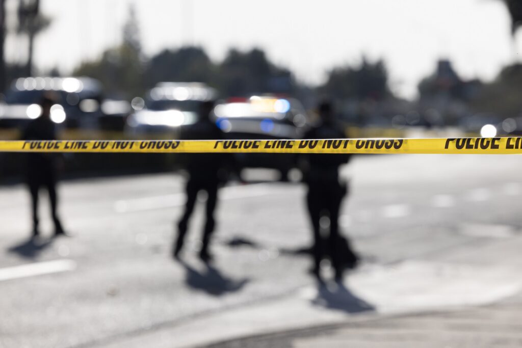 Yellow police tape across a crash scene demonstrates physical evidence related to what to preserve after an Uber accident in Safety Harbor.