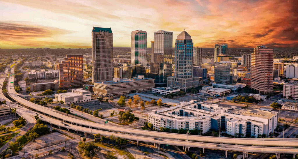 Aerial skyline view of downtown highways represented by experienced Tampa Car Accident Lawyers.