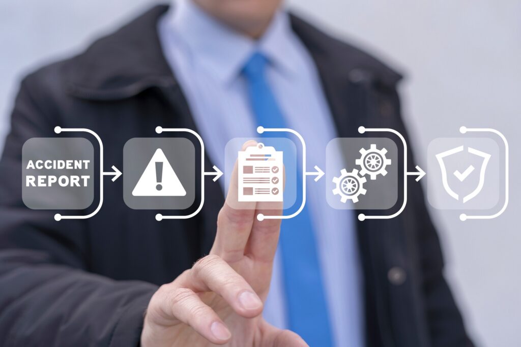Businessman pointing to a digital infographic representing steps in an accident report process.